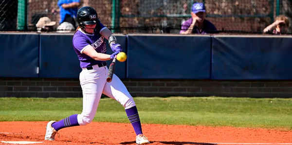 mga softball player hitting ball